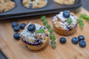 Freshly baked blueberry muffin on a table