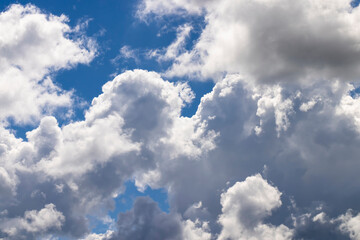 Blue sky with light clouds in windy weather