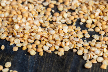 Raw, dry and not cooked porridge of peas on the table