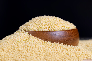 Fresh raw porridge couscous from wheat or millet