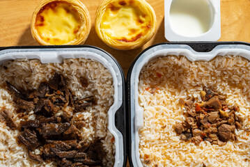 fresh self cooking fast food of rice with egg tart and yogurt