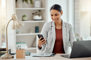 Freelance and remote working business woman checking her phone, reading a message or sending a text...