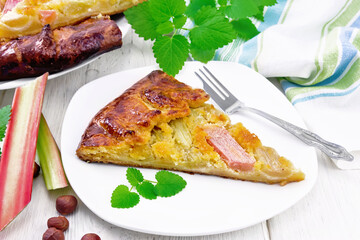 Tart with rhubarb and nut cream on light board