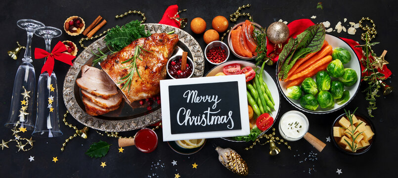 Traditional Christmas Dinner On Dark Background.