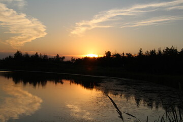 Sunset Over The Land