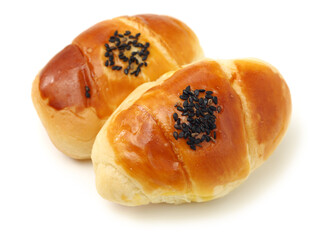 Small breads with black sesame on white background