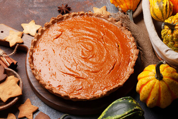 Pumpkin pie and various pumpkins