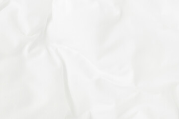 Obraz premium Texture of white blanket and bedding sheet with crumpled or messy in bedroom after wake up.
