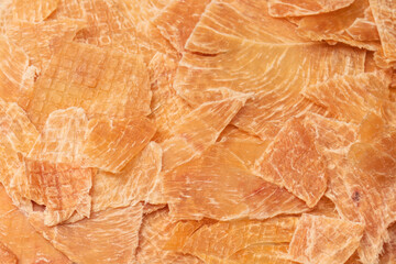 Group of tasty beer snacks. Dehydrated chicken meat slices.