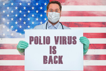 Inscription POLIO VIRUS IS BACK.Doctor holds mockup.detection of poliomyelitis virus.New polio virus infects dozens in USA.US flag background. - obrazy, fototapety, plakaty