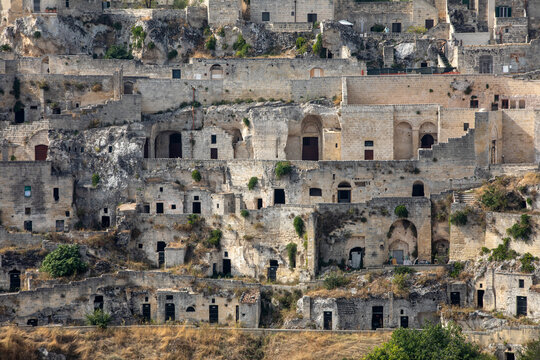 Panoramic view of Sassi di Matera a historic district in the city of Matera, well-known for their ancient cave dwellings from the Belvedere di Murgia Timone,  Basilicata, Italy
