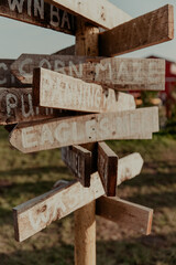 Corn Maze Pumpkin Patch sign post in fall