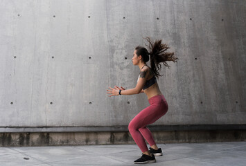 Asian woman exercise fitness bobby jump