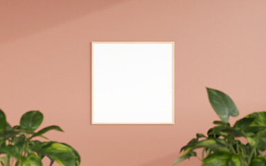 Fototapeta premium Clean and minimalist front view square wooden photo or poster frame mockup hanging on the wall with blurry plant. 3d rendering.