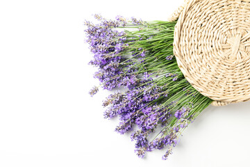 Lavender in wicker bag on white background