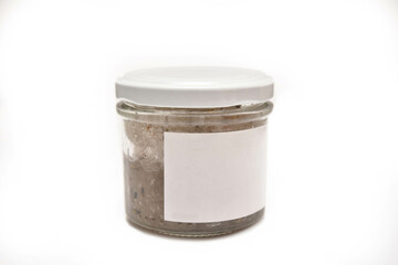 A mockup glass bottle with a blank label