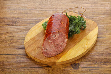 Pork ham sausage over board