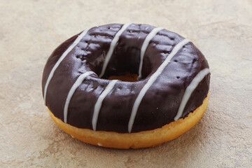 Glazed sweet tasty chocolate donut