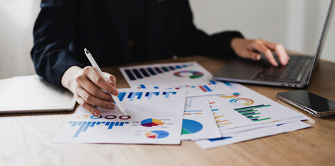 Cropped image of modern computerized businessman and conceptual business strategy. spot focus