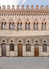 Fototapeta na wymiar Gothic palace facade, Siena, Italy