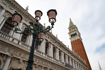 Fototapeta na wymiar Marciana library and bell tower in St. Mark's square in Venice, Italy