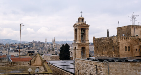 Fototapeta na wymiar The bell tower of the famous Church of the Nativity. Bethlehem