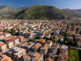 Aerial view on houses and streets of Fondi, town in agricultural valley between Terracina and...