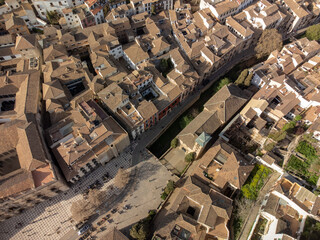 Aerial top panoramic view on buildings, old district, mountains and palace, world heritage city Granada, Andalusia, Spain