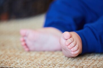 A small newborn baby boy. The concept of childhood