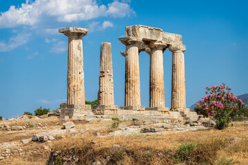 Fototapeta premium Remains of the Ionic Columns in the Temple of Apollo at Ancient Corinth Archaeological Site