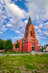 Fototapeta na wymiar Church Of the Assumption of the Blessed Virgin Mary. Nowe Warpno, West Pomeranian Voivodeship, Poland.