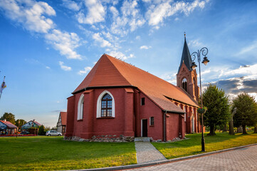 Fototapeta na wymiar Church Of the Assumption of the Blessed Virgin Mary. Nowe Warpno, West Pomeranian Voivodeship, Poland.