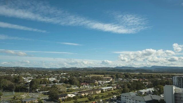 Time lapse of an elevated view of Kirra on the Gold Coast, Queensland, Australia, looking inland. Clouds moving right to left.