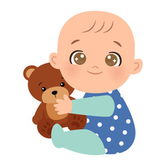Cute baby boy playing with teddy bear