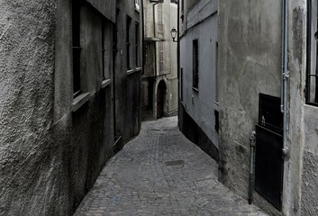 Waiting for the sun to rise at the beginning of the alley, Calolziocorte , Como Lake