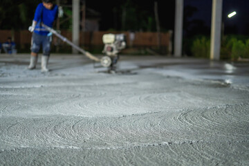 Construction workers use concrete polishers and hard floors.