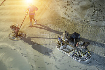 Concrete polishing machine used to make hard floors in industrial plants.