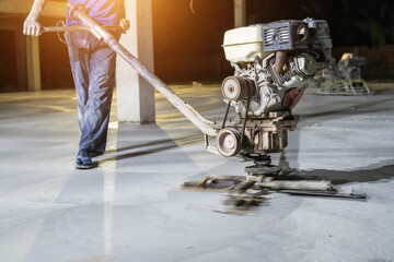 Fototapeta na wymiar Concrete polishing machine used to make hard floors in industrial plants.