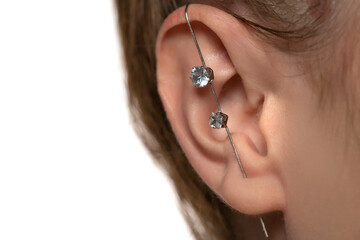 female ear piercing without drilling the helix.