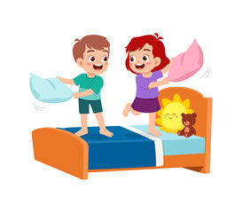 little kid play pillow fight with friend