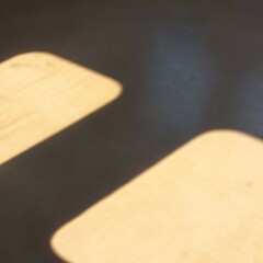 Windows-shaped shadows inside a train