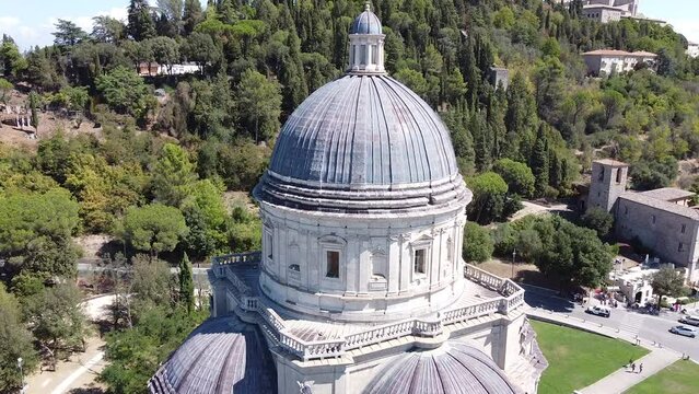 Zooming out Aerial view of Santa Maria della Consolazione, catholic church. Summer season, blue sky sunny day. Todi Umbria. Italy