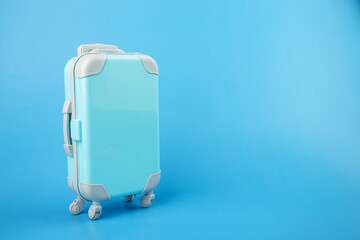 baggage bag, travel luggage, suitcase on a blue background