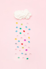Colorful jewelry diamonds falling down from cloud on pastel background. Treasure and wealth concept.