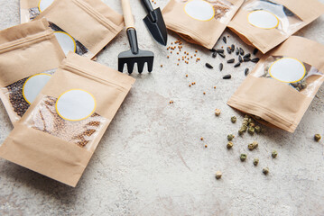 Microgreen seeds in paper bags and equipment for sowing microgreens.