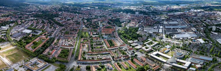 Fototapeta na wymiar Aerial view of the city Schweinfurt in Germany, Bavaria on a overcast day in summer.