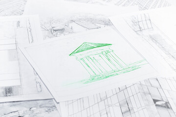 Background on the theme of construction and restoration with lying architectural drawings. Sheets with sketches of the gazebo building.