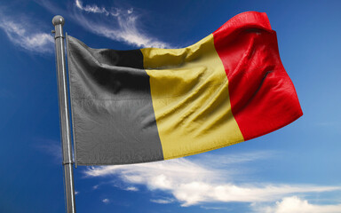 Belgium Flag is Waving Against Blue Sky with Clouds
