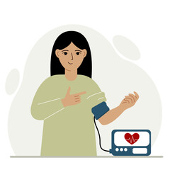 Woman checks blood pressure. healthcare concept. Blood pressure measurement, digital tonometer. Health monitoring.