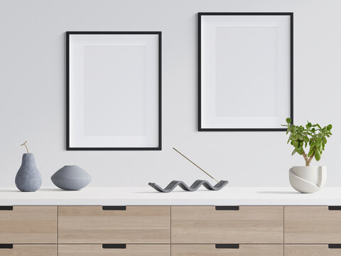 Mockup Picture Frames on a white wall and Cabinet with modern Decoration, 3d Illustration, 3d Rendering